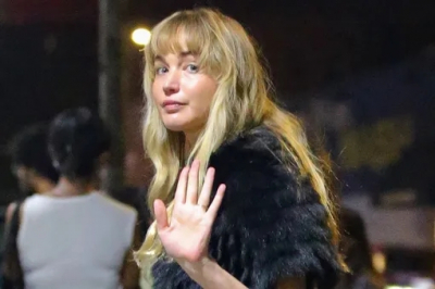 Дженнифер Лоуренс в меховом боа и джинсах: папарацци засняли актрису спустя полгода после родов